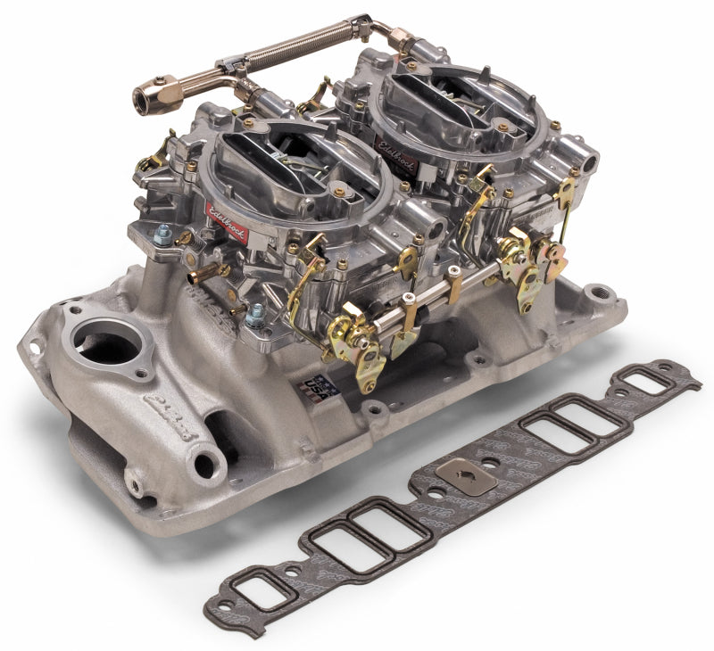 Edelbrock Dual Quad RPM Air Gap intake manifold and carb kit for Ford 390-428 FE engines, showing the intake setup with dual carburetors.