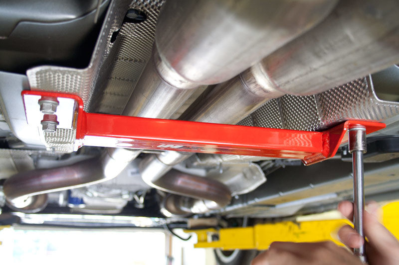 UMI Performance tunnel brace for 2008-2009 Pontiac G8 and 2010-2013 Camaro suspension, shown installed on vehicle chassis.