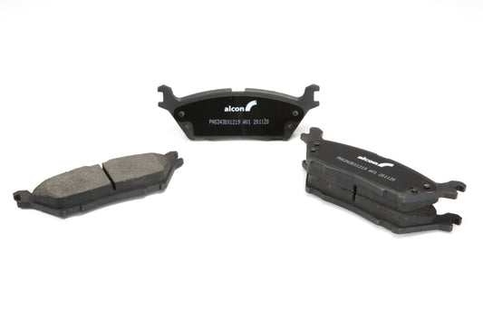Rear Alcon OE brake pads for Ford F-150 2019-2020 with electric park brake, showing the brake pad set and mounting hardware.
