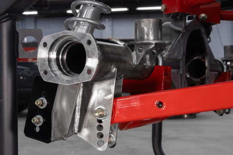 UMI Performance coilover conversion brackets kit with 250lb springs for GM A-body, supports 2-3 inch ride height adjustment.