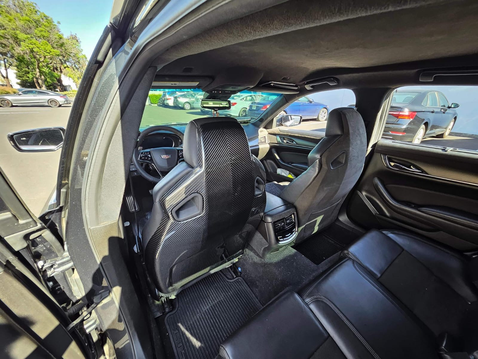 Recaro carbon fiber seat rear panel covers for 2016-2019 Cadillac ATS-V Sedan, driver and passenger side, by Street Driven Performance.