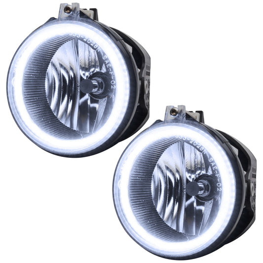 Oracle Jeep Liberty 2005-2007 white SMD fog lights by ORACLE Lighting installed on the front of the vehicle.
