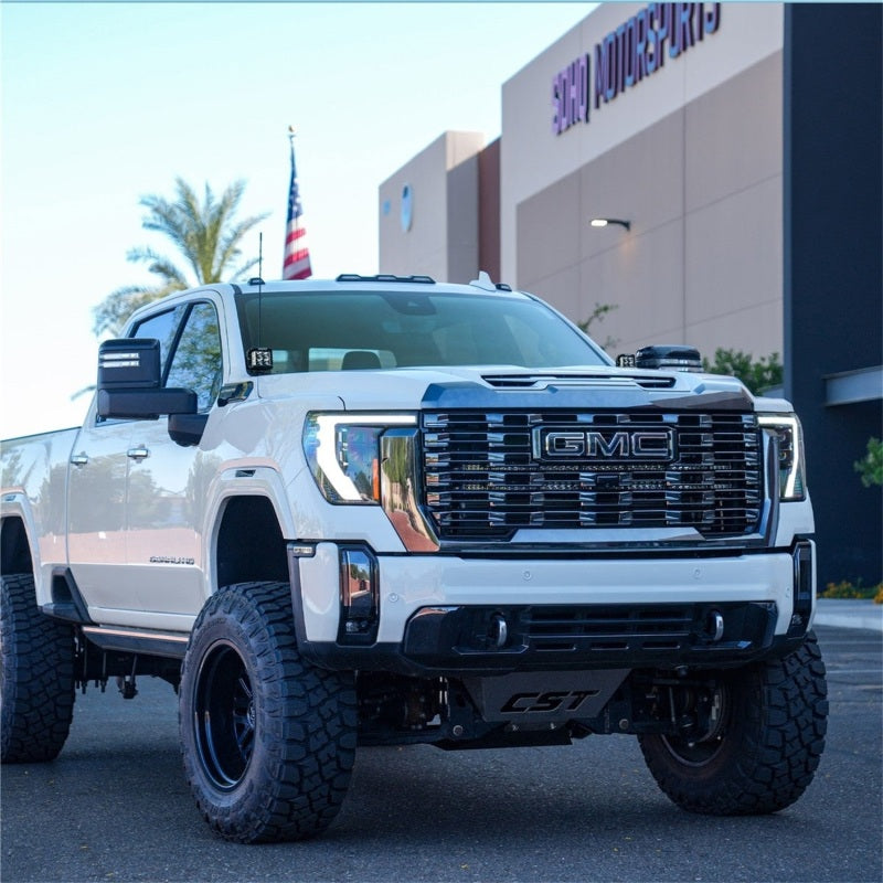 Rigid Industries GMC 2500/3500 HD grill radiance kit with LED light bars and cubes mounted on the front grille.