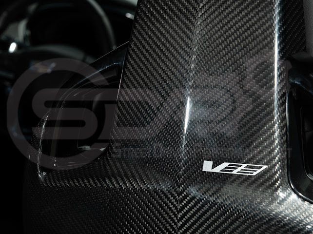 Pair of carbon fiber seat back panels for Cadillac CT5-V and Blackwing interior trim, driver and passenger side.