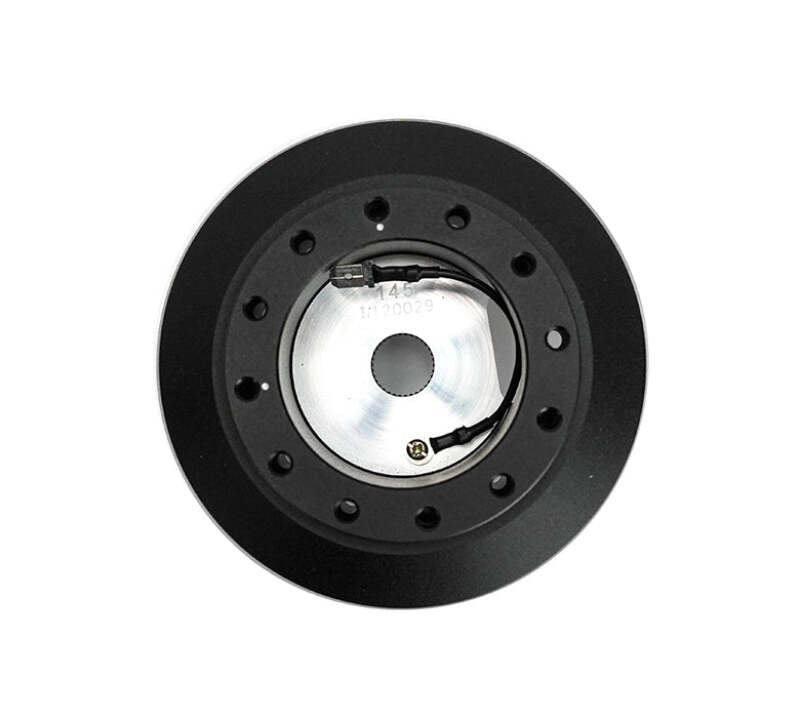 NRG Short Hub for Nissan S14/15 and R33 steering wheels, durable black steering wheel hub compatible with Nissan sports cars.
