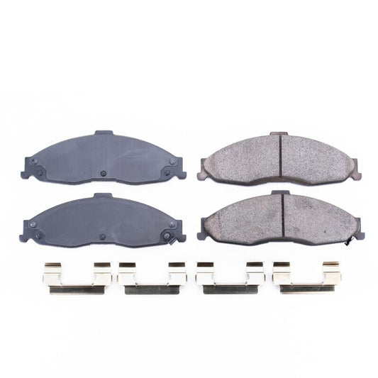 Baer Brakes performance Claw Brake Pads installed in a 1998-2002 Chevrolet Camaro, showing the brake pad design and branding.