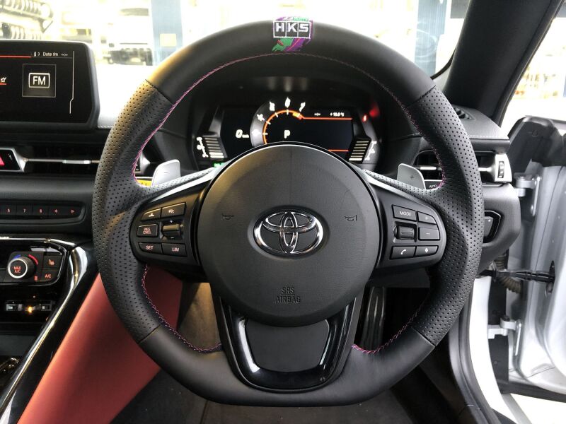 HKS GR Supra replacement steering wheel for A90 model, featuring sporty design and premium materials.