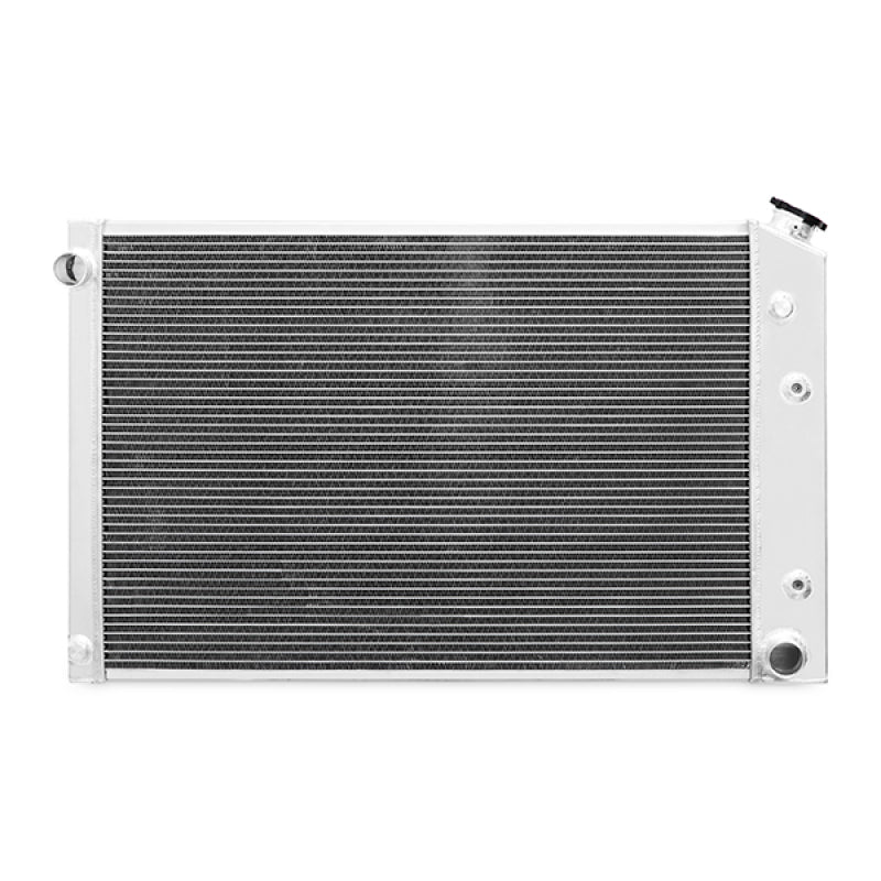 Mishimoto 78-86 GM C/K Truck X-Line aluminum radiator with fins and hoses for enhanced cooling and performance.