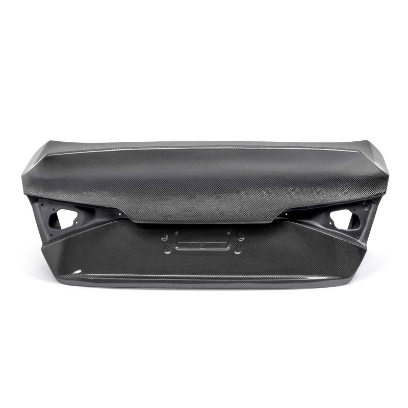 Seibon carbon fiber trunk lid for 2022-2023 Honda Civic 4-door C-Style, showcasing sleek, lightweight design and textured finish.