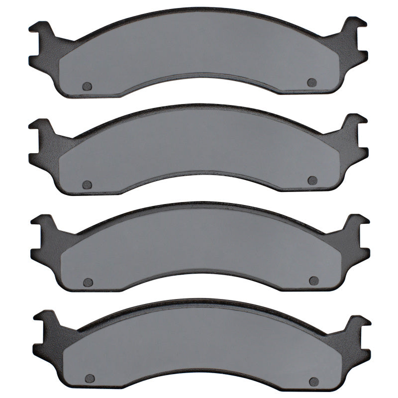 R1 Concepts performance front brake pads for Ford E-350 Super Duty 1995-2007, showing the brake pad set and backing plates.