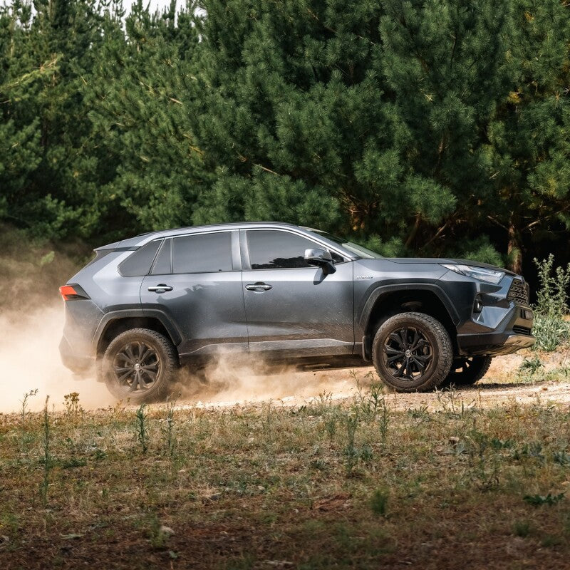Bilstein B8 TerraSport lift kit shocks and struts for Toyota RAV4, 1.5-inch lift, showing sturdy suspension components.