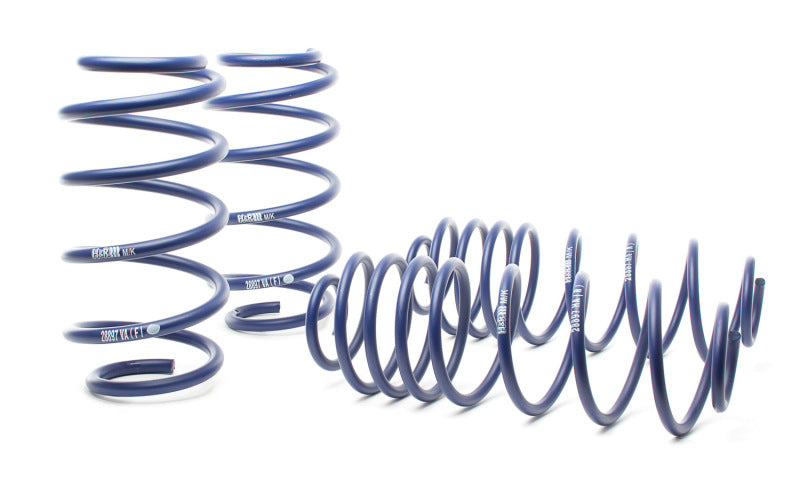 H&R lowering sport springs for 12-16 Volkswagen Beetle 1.8T, 2.5L, TDI engine, visible installed on vehicle.