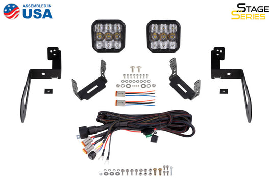 Diode Dynamics Jeep JK SS5 CrossLink bumper lightbar kit for Pro driving lights on a rugged off-road vehicle.