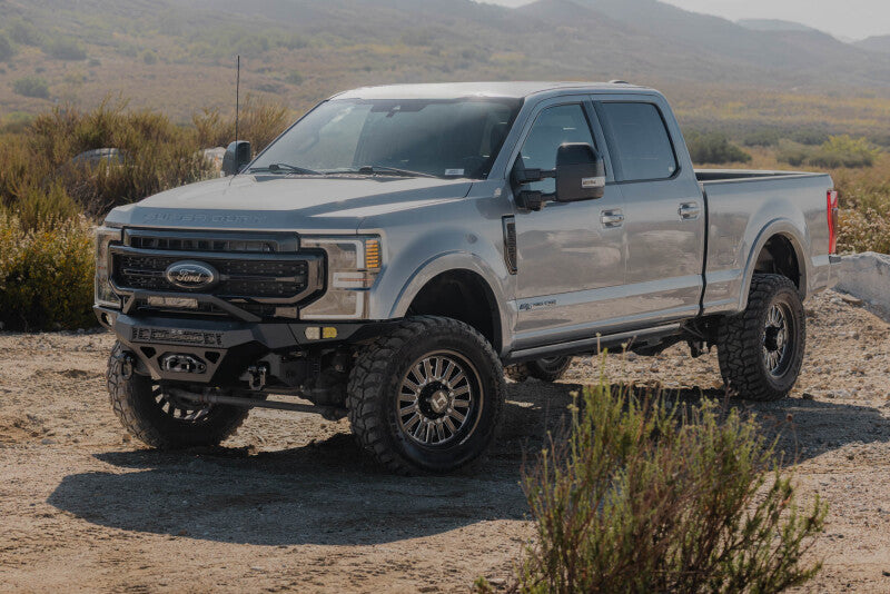 Steel front bumper for Ford Super Duty F-250/F-350 from DV8 Offroad Spec Series, featuring heavy-duty construction and mounting points.
