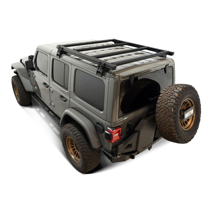 Westin 18-26 Jeep Wrangler JL Unlimited Mesa Roof Rack mounted on vehicle with metal bars and mounting brackets, outdoor setting