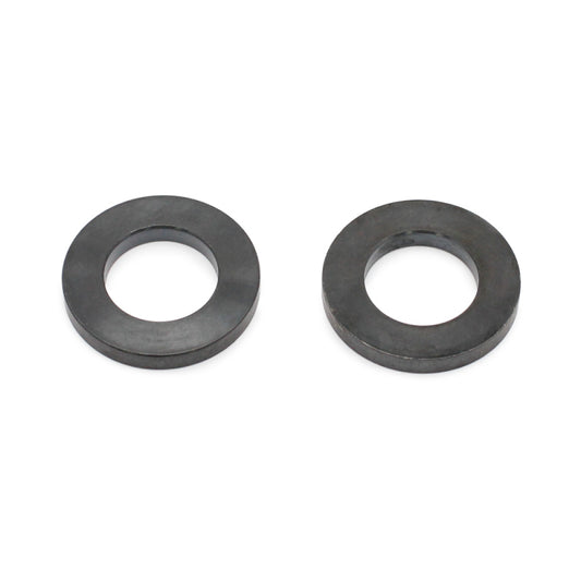 Wilwood spacer spindle .86 inch offset with 1.50 inch thickness, designed for automotive suspension applications.