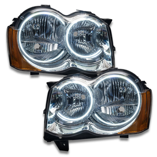 Oracle Lighting white non-HID headlight for Jeep Grand Cherokee 2008-2010, featuring SMD LED daytime running lights.