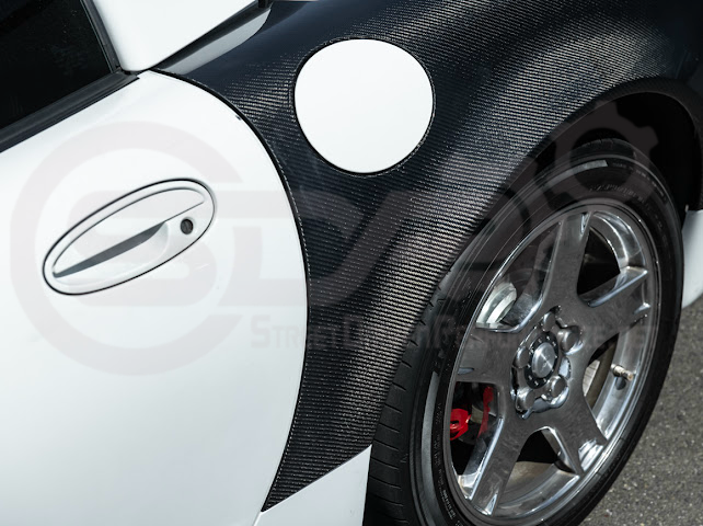 Factory style carbon fiber front and rear widebody fenders for 1997-2004 Chevrolet Corvette C5 hatchback by Street Driven Performance