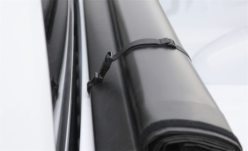 Access Limited roll-up truck bed cover on a 8ft Ford F-150 bed, exterior truck bed accessory in black with textured surface.