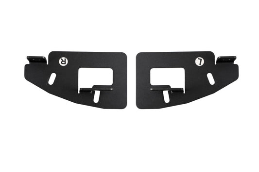 Diode Dynamics Stage Series fog pocket mounting brackets installed on a 2019-present Ram truck for light mounting.