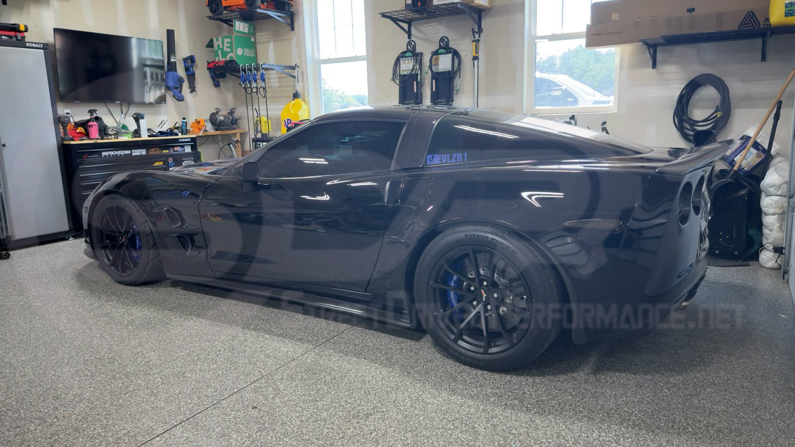 Street Driven Performance carbon fiber rear trunk lid wing spoiler for 2005-2013 Chevrolet Corvette C6, with an aggressive style design.
