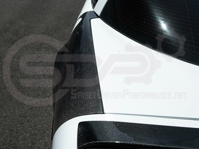 Factory style carbon fiber front and rear widebody fenders for 1997-2004 Chevrolet Corvette C5 hatchback by Street Driven Performance.