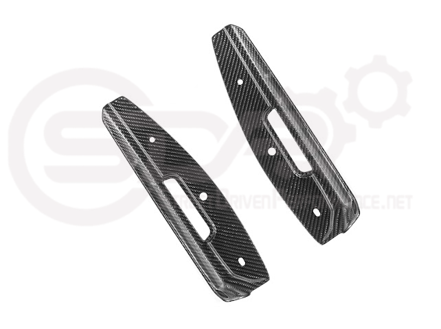 Cadillac CT5-V Blackwing factory OEM style carbon fiber front lip splitter with ground effects and wheel arches, street-driven performance.