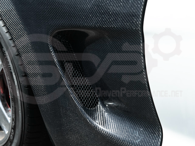 Factory style carbon fiber front and rear widebody fenders for 1997-2004 Chevrolet Corvette C5 hatchback by Street Driven Performance.