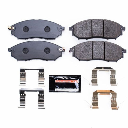 PowerStop front track day brake pads for Infiniti EX35, high-performance racing brake pads with metal backing plates.