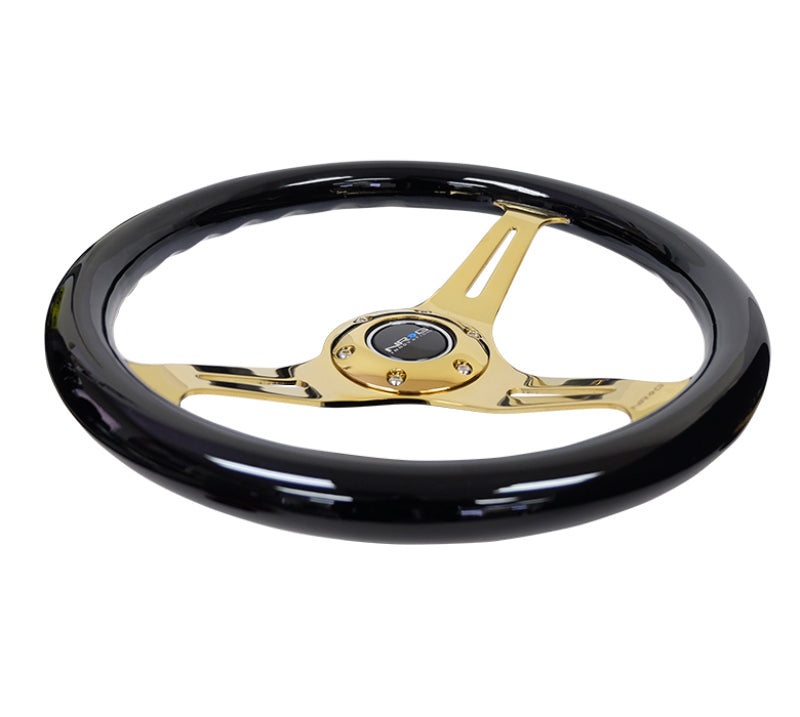 NRG Classic wood grain steering wheel with black grip, chrome gold 3-spoke center, 350mm diameter for car interiors.