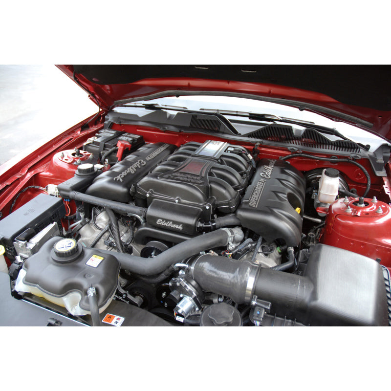 Edelbrock Supercharger Stage 1 Street Kit installed on a 2010 Ford Mustang 4.6L V8 engine with tuner, showcasing the supercharger unit.
