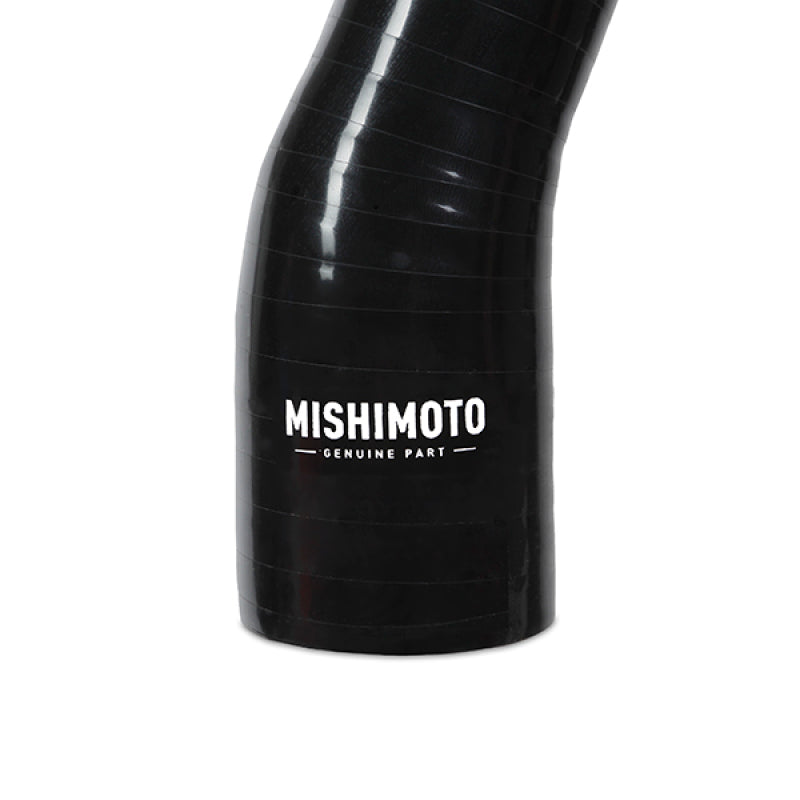 Mishimoto silicone upper radiator hose for 78-86 GM C/K trucks, durable black hose with metal clamps installed.
