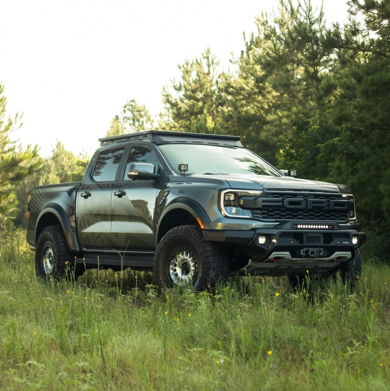 Rival 4x4 aluminum roof rack for Ford Ranger 24-26 and Ranger Raptor, shown mounted on vehicle roof for cargo storage.
