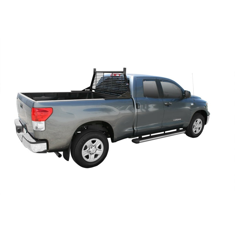 Westin black headache rack installed on a Chevrolet Silverado pickup truck, showcasing durable steel construction for truck cab protection.