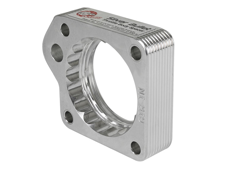 aFe Silver Bullet Throttle Body Spacer for Ford Ranger and Explorer V6 4.0L engine, showing the metallic spacer component.