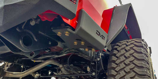 DV8 Offroad Jeep Gladiator 2019+ bedside sliders, exterior body armor and rock rails for side protection.