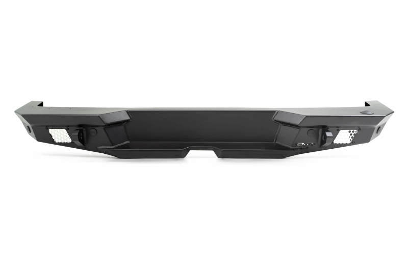 Steel rear bumper for 2018 Jeep Wrangler JL by DV8 Offroad with optional tire carrier, rugged off-road vehicle accessory.