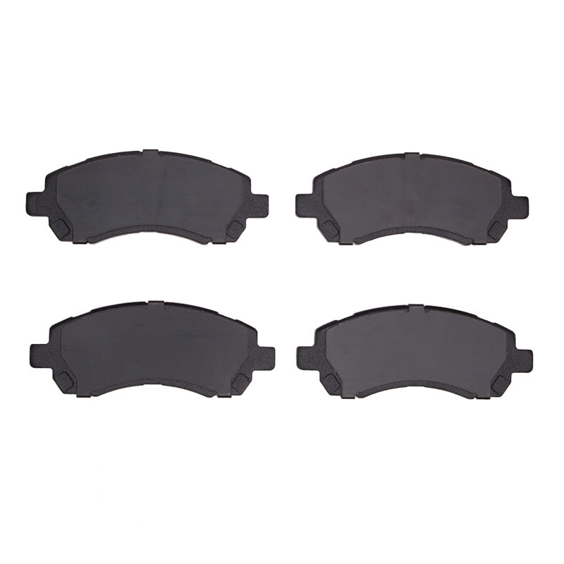 R1 Concepts OE ceramic brake pads for Subaru Legacy R1 97-01 front brake system, showing two new brake pads with metal backing plates.