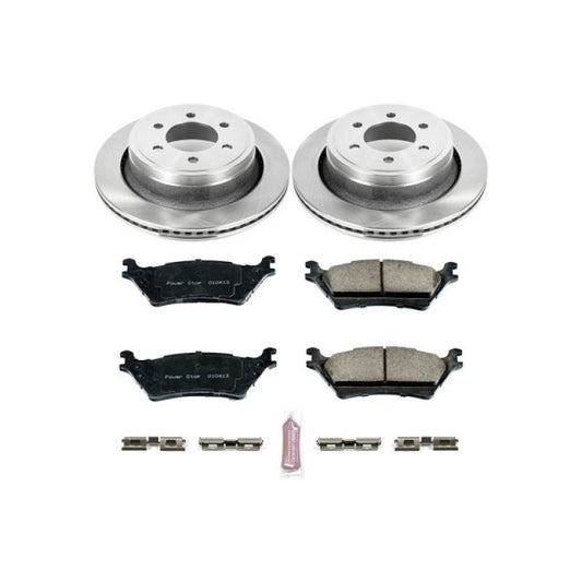 PowerStop OE rear brake kit for 2012-2018 Ford F-150, including brake pads and rotors, installed on the vehicle's rear axle.