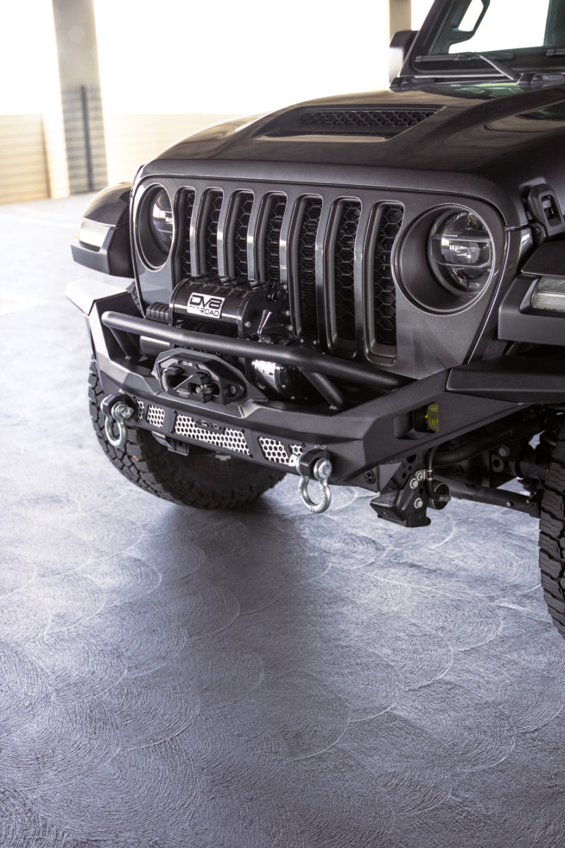 Steel front bumper for Jeep Wrangler JK, JL, and Gladiator JT by DV8 Offroad, featuring rugged off-road design and heavy-duty construction.