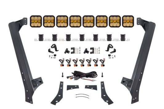 Diode Dynamics Jeep JK SS5 Sport CrossLink windshield yellow combo lightbar kit with LED light bars and mounting brackets.