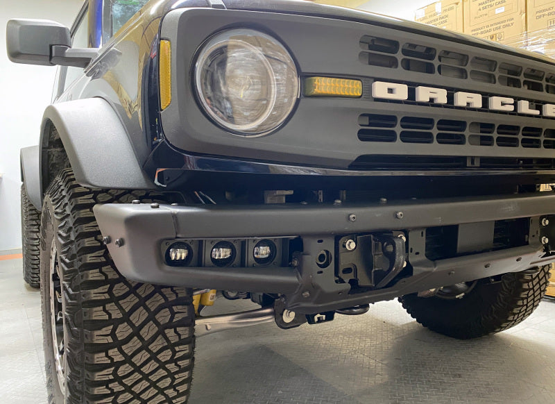 ORACLE Lighting Ford Bronco 21-22 triple LED fog light kit with white lights installed on steel bumper
