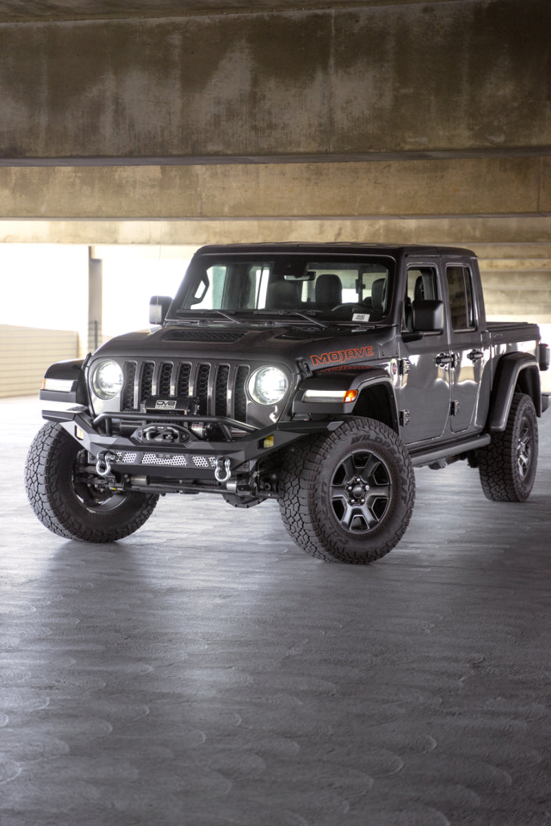 DV8 Offroad steel front bumper for Jeep Wrangler JK, JL, and Gladiator JT with rugged design and mounting points.