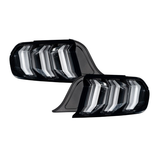 Pair of FORM Lighting Ford Mustang LED tail lights in smoke finish, featuring sleek design and bright illumination.