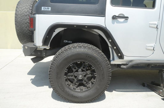 Black DV8 Offroad aluminum inner fender liner for Jeep Wrangler JK 2007-2018 rear wheel well, durable offroad wheel well liner.