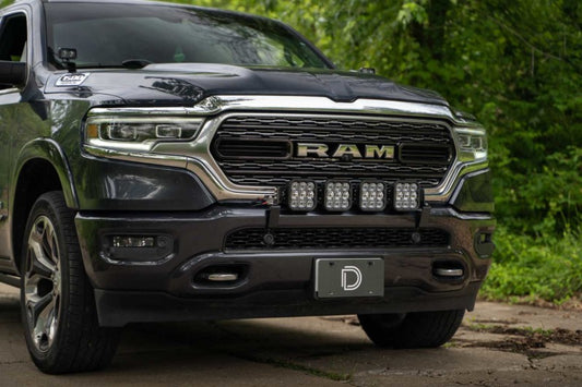 Diode Dynamics SS5 Grille CrossLink Lightbar Kit for 2019-present Ram Sport with white light bars installed in grille.