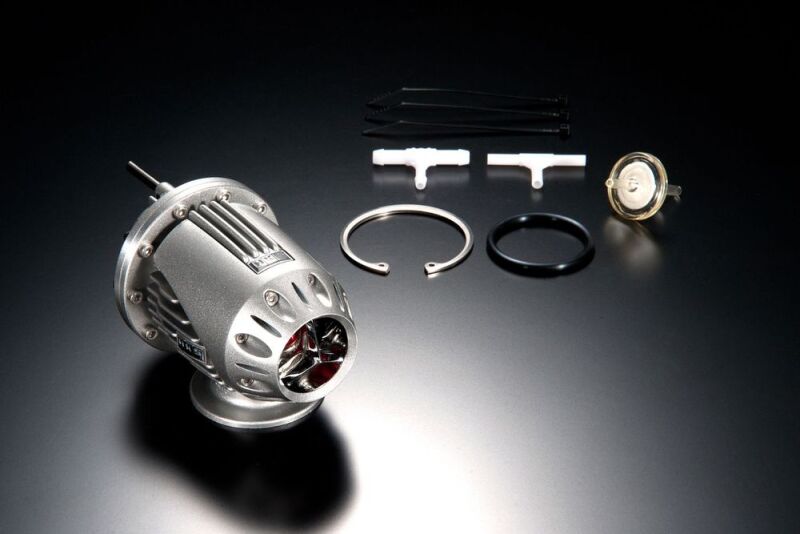 HKS Super SQV4 blow-off valve for FL5, showing the black and silver device with mounting components and hoses.