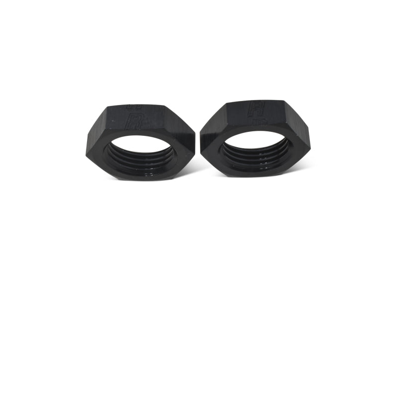 Russell Performance black flare to pipe adapter showing a 90-degree angle fitting for -4 AN to 1/8 inch NPT in a close-up view.