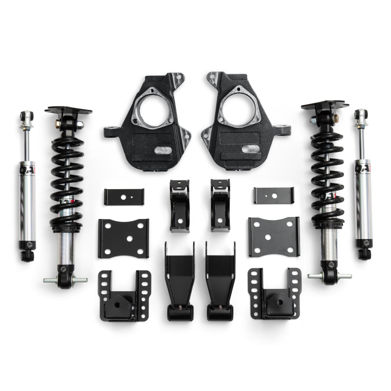 QA1 Chevrolet Silverado 4WD lowering spindles, adjustable from 4 to 6 inches, shown installed on a Silverado truck.