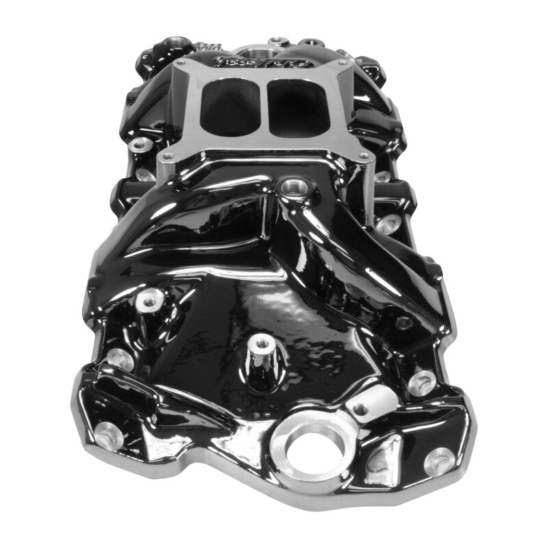 Edelbrock Chevy SB Performer RPM intake manifold with black plasma finish, showing the polished aluminum construction and intake ports.